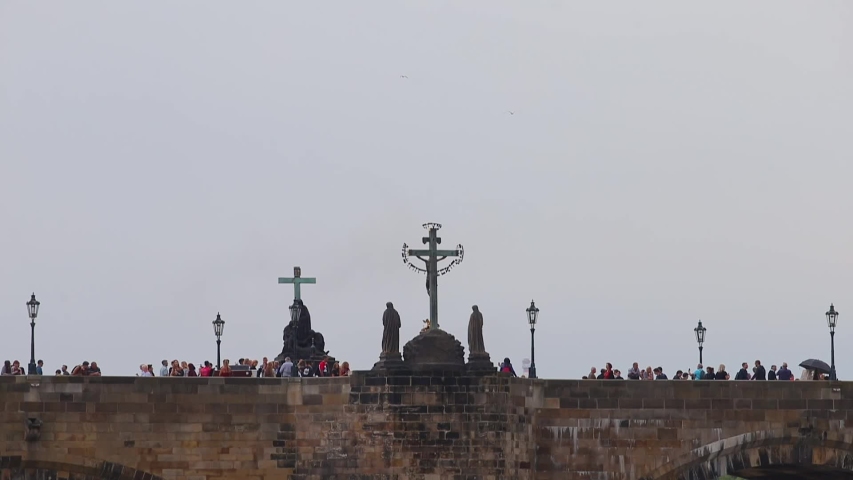 Prague is famous for its well-preserved historical and cultural landmarks. Praha, is the capital and largest city of the Czech Republic. People on Charles bridge