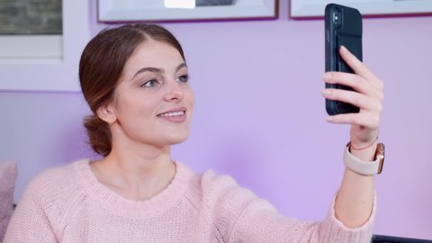 Girl makes selfies in home