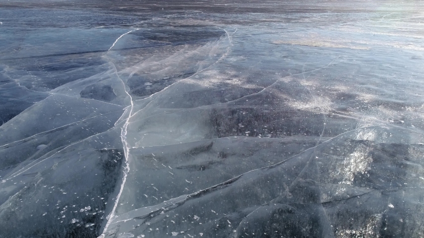 walking over frozen Baikal Lake.