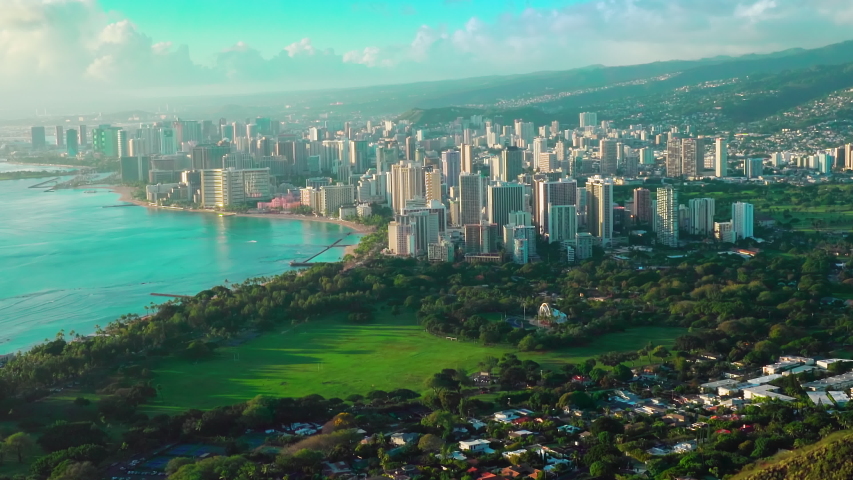 Aerial view of Diamond Head Crater with Honolulu skyline in the background. Oahu island, Hawaii. United States. Royalty-Free Stock Footage #1037932892