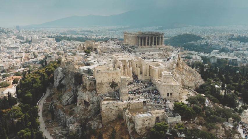 Aerial view of crowded tourist place near the Parthenon temple on Acropolis in Athens, Greece Royalty-Free Stock Footage #1037935259