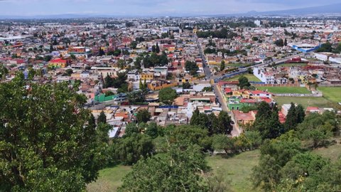 City view of Cholula, located in the central Mexican state of Puebla. Shoot on top the Tlachihualtepetl pyramid (also known as Great Pyramid of Cholula).