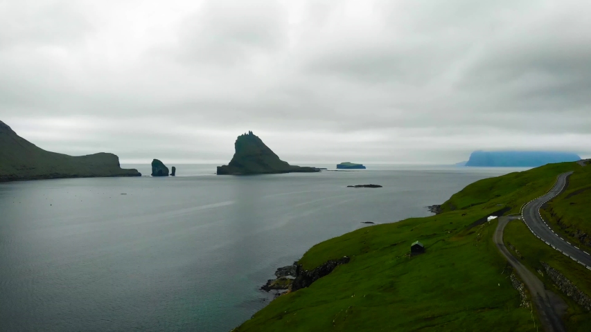 Aerial view of Tindholmur and Drangarnir islands in Faroe Islands, a territory of Denmark in the Atlantic Ocean.