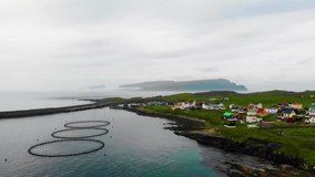 Aerial viewof the town in the Faroe Islands, a territory of Denmark in the Atlantic Ocean. Salmon production.