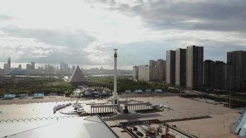 beautiful pyramid with an eagle in Kazakhstan against the background of the city, view from a quadrocopter