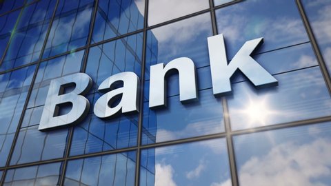 Bank sign on glass building. Mirrored sky and city on modern facade. Business and finance concept in 3D rendering animation.