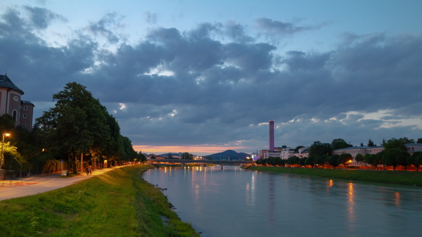 sunset night illumination salzburg city riverside panorama 4k timelapse austria