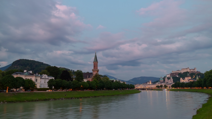 sunset night illumination salzburg city riverside panorama 4k timelapse austria