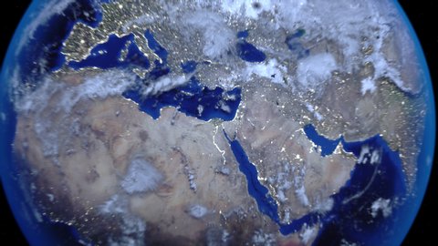 Zoom out of Israel through clouds to see the Earth from space.