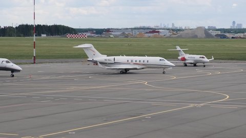 Moscow, Russia - July, 2019: Private jet taxiing for take off at Sheremetyevo international airport. Timelapse