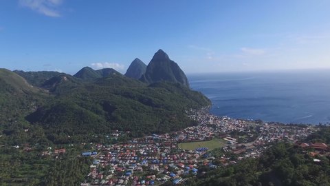 The small town of Soufriere beneath the Pitons of St. Lucia (aerial photography)