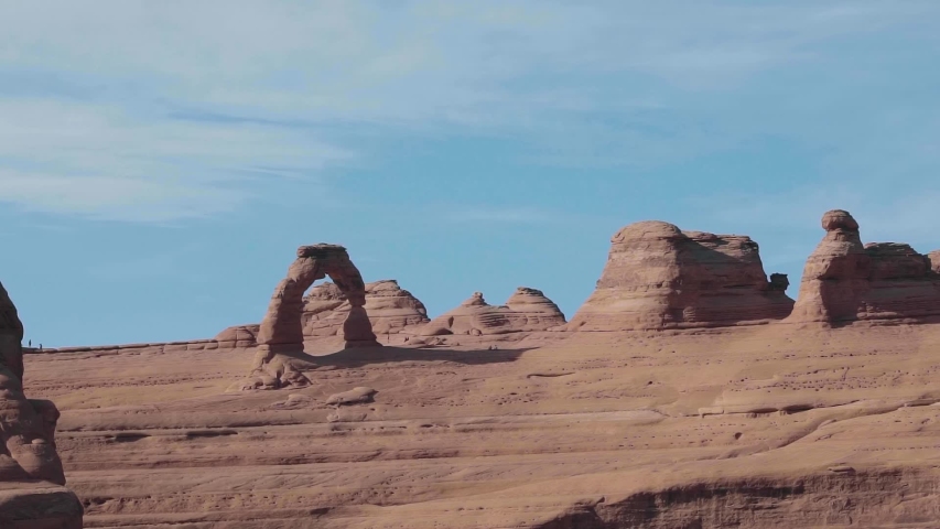 Famous delicate arch on a gorgeous warm summer day from the Arches lookout hike in Moab, Utah.