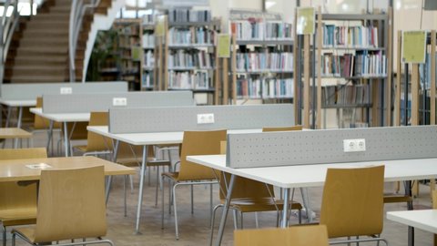 Library setting with books and reading material. Public library interior. Modern library concept