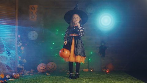 Girl Child In A Witch Costume For A Scary Halloween Party