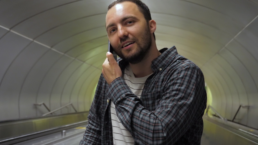 Cheerful man calling to friend.