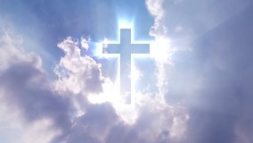 Christian cross appears bright in the sky background video footage