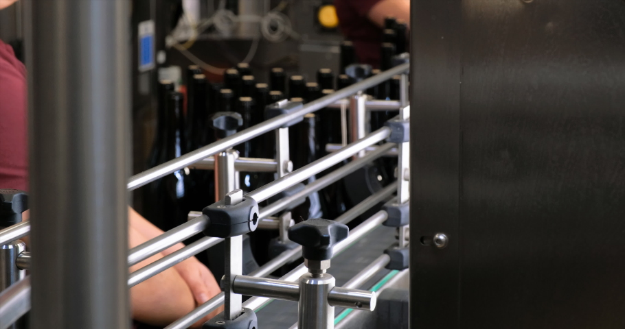 conveyor with wine bottles at the factory in Armenia