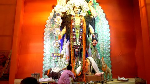 Kolkata,India - October 19, 2017 : Indian Hindu Goddess Kali is being worshipped inside decorated pandal, a temporary temple,at night. Kali Puja or Shyama Puja or Mahanisha Puja, is a Indian festival.