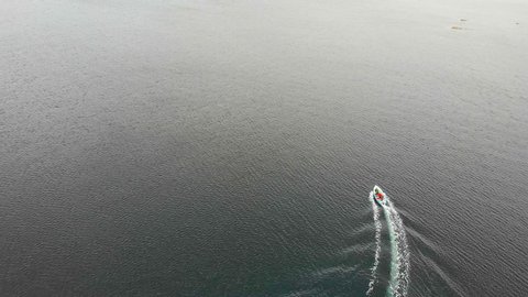 Aerial view of a small boat on the ocean