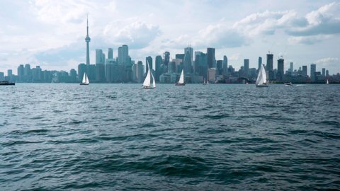 Toronto skyline view from lake ontario with boats