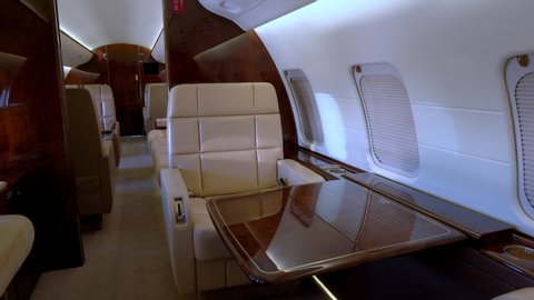Modern private business jet leather seats and interior