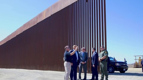 CIRCA 2019 - highlights of U.S. president Donald Trump touring the border wall with border patrol agents.