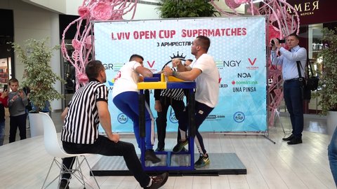 LVIV, UKRAINE - SEPTEMBER 29, 2019: Participants of a tournament on Arm wrestling «Lviv Open Cup Supermatches». 