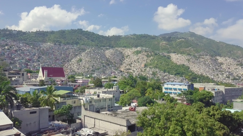 PORT AU PRINCE, HAITI - CIRCA 2019 - Amazing aerial over the slums, favela and shanty towns in the Cite Soleil district of Port Au Prince, Haiti.