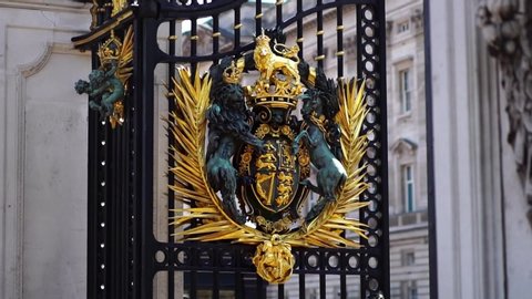 Open gates at the Buckingham Palace. Concept of royal British kingdom, traditional wealth, history of London. Slow motion
