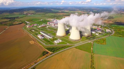 Aerial view to nuclear power plant. Atomic power stations are very important sources of electricity with low carbon footprint. Emissions and environment in 21th century.
