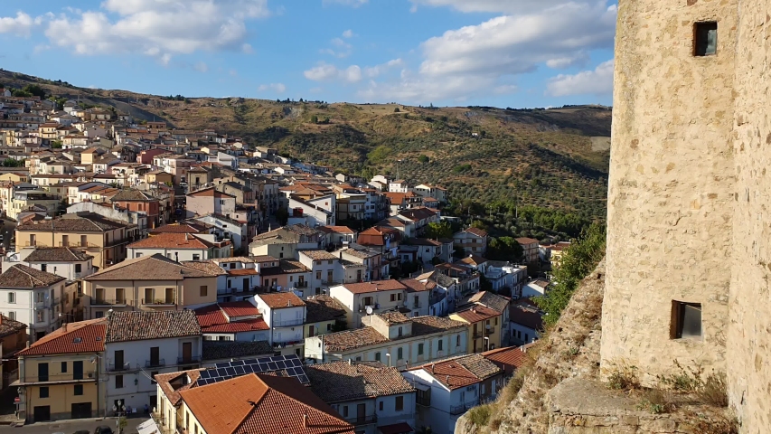 Pan Shot of Oriolo, in Basicilata, in the South of Italy on Blue Sky Background