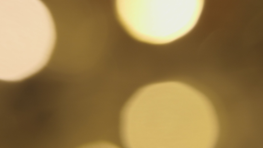 Warm pulsating christmas party lights with bokeh effect on black bacgrkound | Shutterstock HD Video #1038130937
