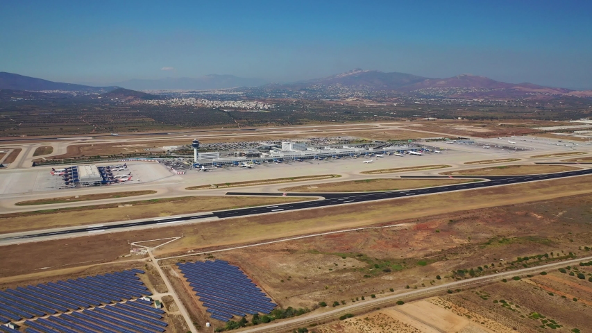 Aerial video taken from inside an aircraft of modern Athens International airport - Eleftherios Venizelos, Attica, Greece