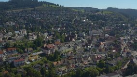Aerial view of the city Neustadt in Germany in the black forest on a sunny day in summer. Pan to the right around the city.