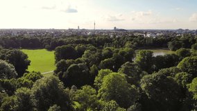 Munich city skyline and Englischer Garten, drone video, aerial view