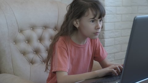Forbidden website. Nice child becomes scared when she saw something frightened on internet.