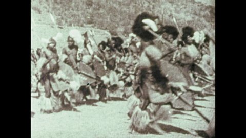 1970s: AFRICA: Native Africans dance. Boer and Zulu army in battle.