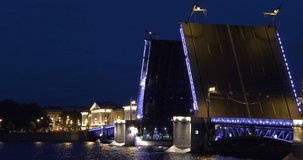 4K night video of beautiful illuminated vintage architecture, Neva River, streets of Saint Petersburg city center and bridge draw at Neva River embankment of the Russia's northern capital