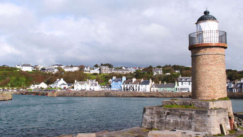 Video of Lighthouse and Harbour of Portpatrick in Dumfries and Galloway in Scotland. 4K stock footage. Video full hd.