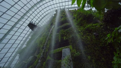 Singapore, Dec 27  2018 
Wide angle view of waterfall in cloud dome
