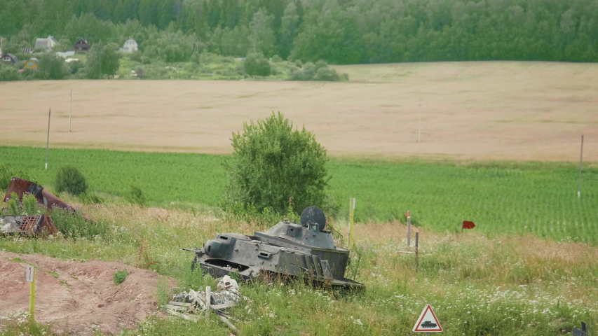 Rusty destroyed tank on the battlefield after the second world war