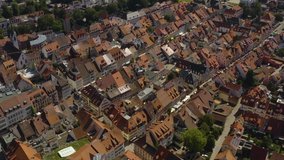 Aerial view of the city Villingen-Schweningen in Germany in the black forest on a sunny day in summer. Pan to the right around the old town.