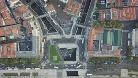 Aerial drone top view of a busy road intersection in Funchal city, Madeira island, Portugal