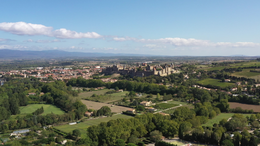 Aerial view of the Cité de Carcassonne, beautiful medieval citadel located on a hill on the right bank of the River Aude in the department of Aude, Occitanie region, France