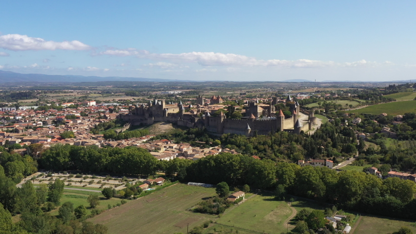 Aerial view of the Cité de Carcassonne, beautiful medieval citadel located on a hill on the right bank of the River Aude in the department of Aude, Occitanie region, France