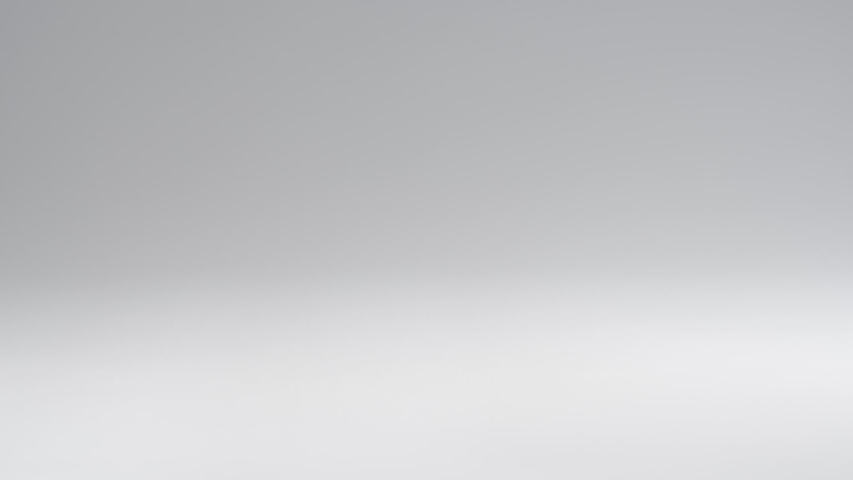 Time for Halloween. Delicious candy corn falls in slow motion.