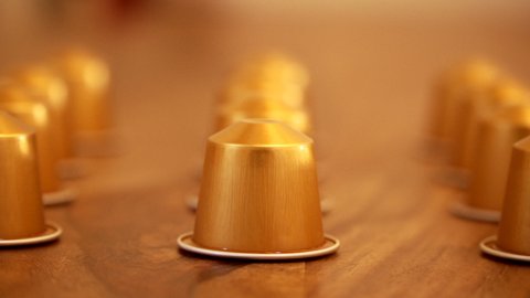 Closeup on Nespresso volluto coffee capsules composition