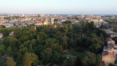 From botanic garden to cathedral aerial shot Montpellier sunset France