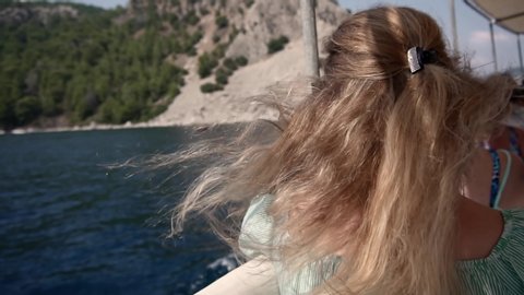 Hair Fluttering In The Wind On Sea Boat.Slow Motion Hair Flowing.Blonde Blowing Locks On Wind.Woman On Holiday Vacation Travel Adventure Trip.Girl Relaxing And Enjoying View In Sightseeing Boat. Stock Video