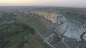 Arial video of magnificent White cliff in Belogorsk area, Crimea peninsula at sunset.  Amazing views of wild west landscapes.